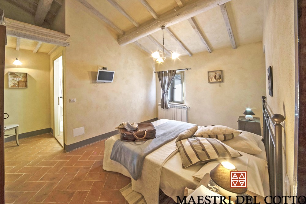 zona notte con pavimento in cotto