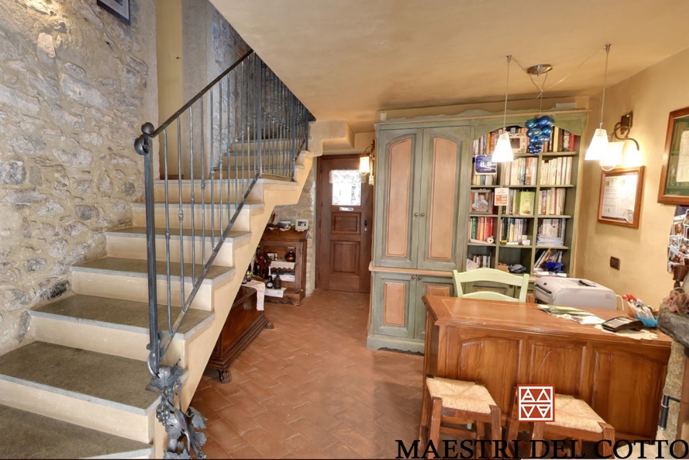 reception albergo con pavimento in cotto